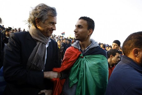 Bernard Henry Lévy in Benghazi with a representative of the Youth Defense Committee of the City. (photo credit: Marc Roussel)